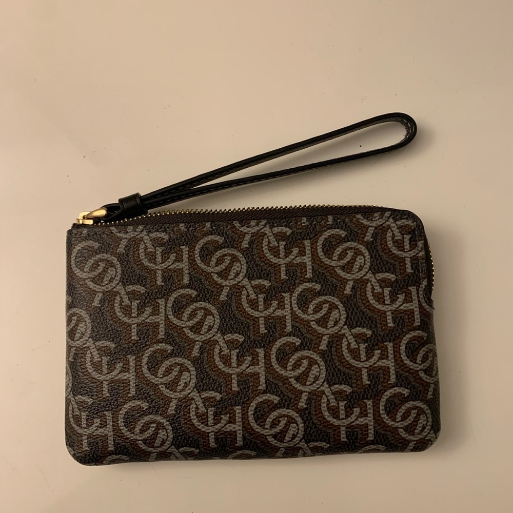 Authentic Coach wristlet. Brown and black with gold hardware.